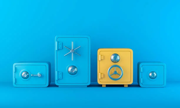 Blue and yellow safes representing tax-free Cash ISA savings