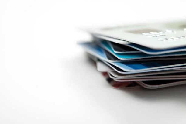 Stack of credit cards representing borrowing and financial flexibility.